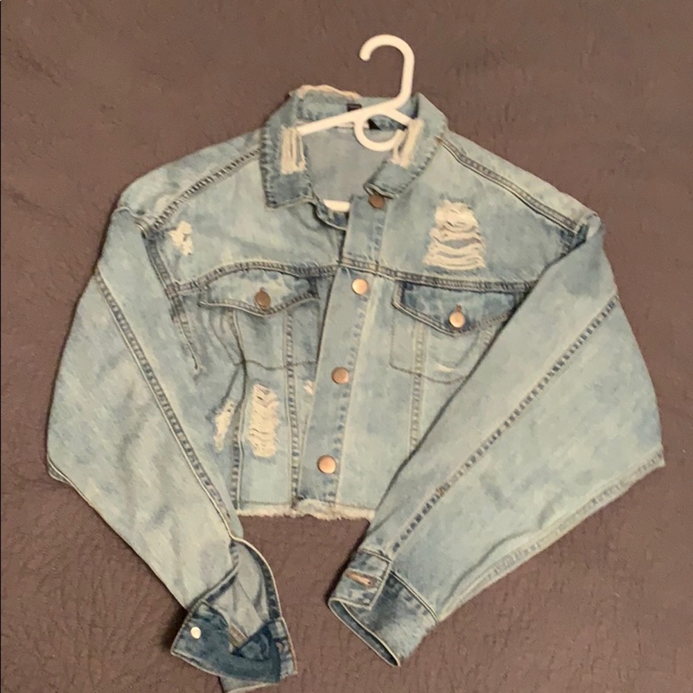 Cropped blue Jean jacket with rips